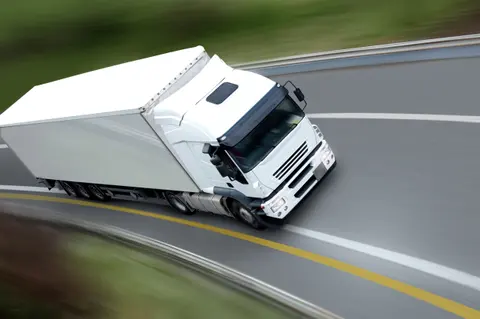 nadya-group-white-truck-on-road_huiC